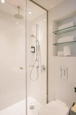Ein Badezimmer in der Unterkunft Homaris West Side - Self-Check In