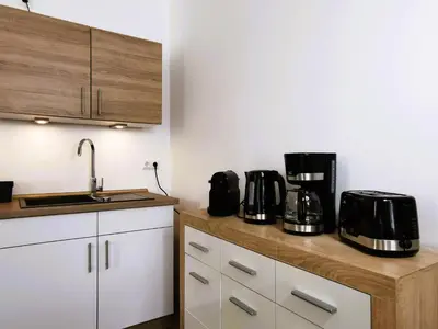 Küche/Küchenzeile in der Unterkunft BohnApartments Franzstraße - kostenlose Parkplätze - sehr ruhig - Neubau - Vollausstattung - WLAN