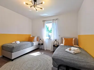 Ein Bett oder Betten in einem Zimmer der Unterkunft BohnApartments Franzstraße - kostenlose Parkplätze - sehr ruhig - Neubau - Vollausstattung - WLAN