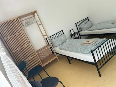 Ein Bett oder Betten in einem Zimmer der Unterkunft Dorfstraße 32a - individuelle Unterkunft für bis zu 13 Personen