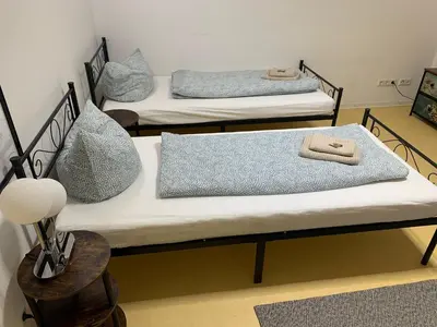 Ein Bett oder Betten in einem Zimmer der Unterkunft Dorfstraße 32a - individuelle Unterkunft für bis zu 13 Personen