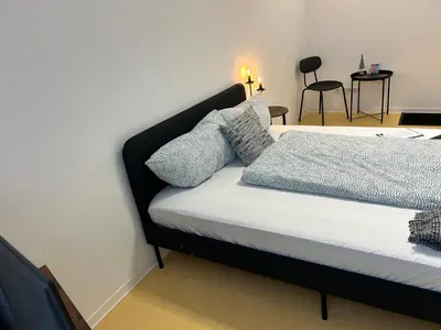 Ein Bett oder Betten in einem Zimmer der Unterkunft Dorfstraße 32a - individuelle Unterkunft für bis zu 13 Personen