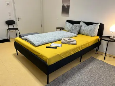 Ein Bett oder Betten in einem Zimmer der Unterkunft Dorfstraße 32a - individuelle Unterkunft für bis zu 13 Personen