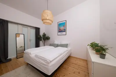 Ein Bett oder Betten in einem Zimmer der Unterkunft Apartment nähe Schloss Bellevue - 95QM
