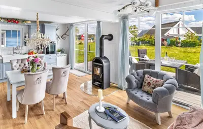 Ein Sitzbereich in der Unterkunft La Petite Maison Bleue