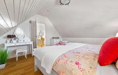 Ein Bett oder Betten in einem Zimmer der Unterkunft La Petite Maison Bleue