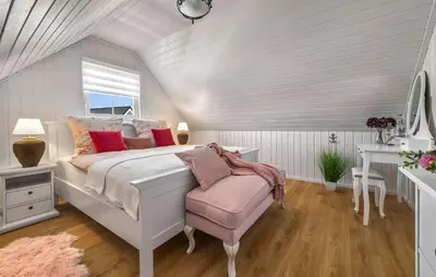 Ein Bett oder Betten in einem Zimmer der Unterkunft La Petite Maison Bleue