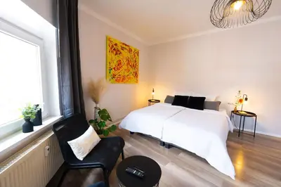 Ein Bett oder Betten in einem Zimmer der Unterkunft BetterBeds City - Apartments - Zentral - Smart TV - Küche - WLAN