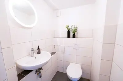 Ein Badezimmer in der Unterkunft BetterBeds City - Apartments - Zentral - Smart TV - Küche - WLAN