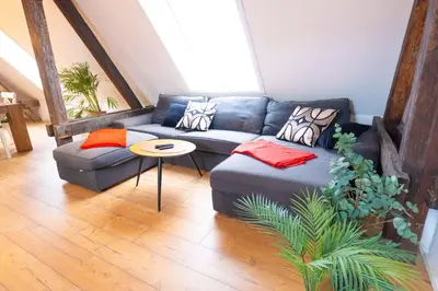 Ein Sitzbereich in der Unterkunft BetterBeds City - Apartments - Zentral - Smart TV - Küche - WLAN