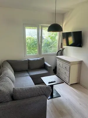 Ein Sitzbereich in der Unterkunft Ferienhäuser am Heidesee
