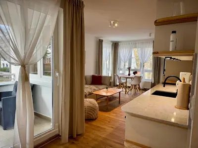 Ein Bett oder Betten in einem Zimmer der Unterkunft S4 FeWo in Bad Saarow, Seestr 4a