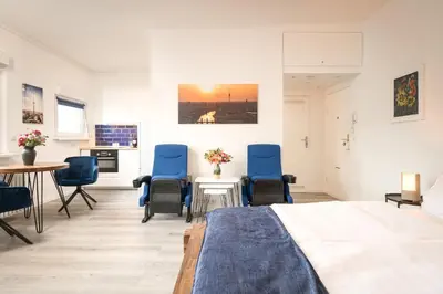 Ein Sitzbereich in der Unterkunft Boardinghouse Hohenzollern
