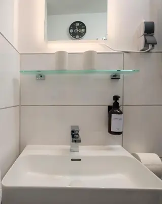 Ein Badezimmer in der Unterkunft Boardinghouse Hohenzollern