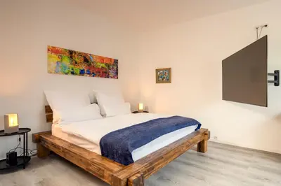 Ein Bett oder Betten in einem Zimmer der Unterkunft Boardinghouse Hohenzollern