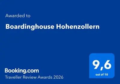 Ein Zertifikat, Auszeichnung, Logo oder anderes Dokument, das in der Unterkunft Boardinghouse Hohenzollern ausgestellt ist