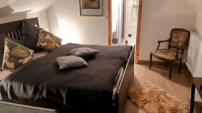 Ein Bett oder Betten in einem Zimmer der Unterkunft Gesinde Loft