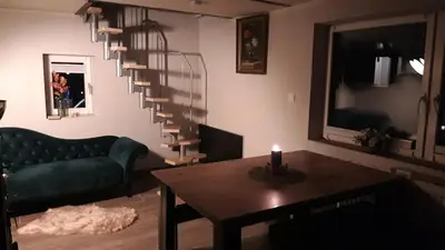 Ein Sitzbereich in der Unterkunft Gesinde Loft