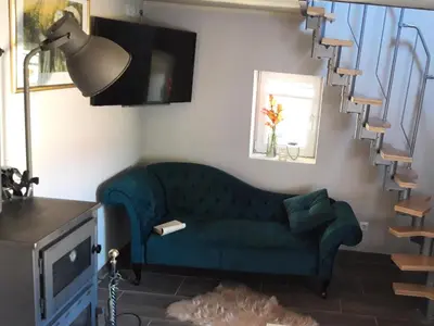 Ein Sitzbereich in der Unterkunft Gesinde Loft