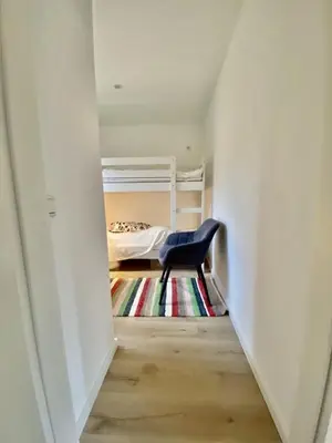 Ein Sitzbereich in der Unterkunft Ferienbungalow Arne am Wald