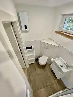 Ein Badezimmer in der Unterkunft Ferienbungalow Arne am Wald