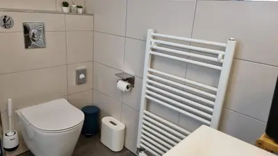 Ein Badezimmer in der Unterkunft Exclusives Loft, Klimaanlage, Parkplatz, Netflix & Disney, DominosPizza, Wallbox