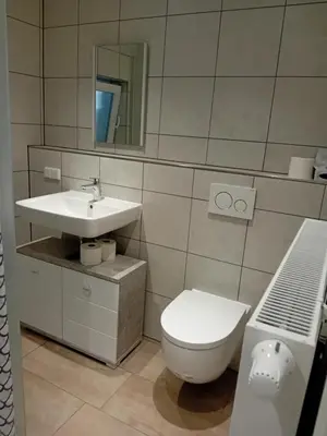 Ein Badezimmer in der Unterkunft Zur weissen Taube Haus 2 Große Monteurs und Handwerkerwohnung nahe Berlin und Brandenburg