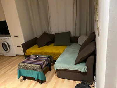 Ein Sitzbereich in der Unterkunft Köpenick spree 1 bed room house