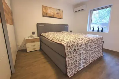 Ein Bett oder Betten in einem Zimmer der Unterkunft Bungalow am Berliner Stadtrand