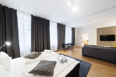 Ein Bett oder Betten in einem Zimmer der Unterkunft Grand Central City Apartments Mitte Museumsinsel