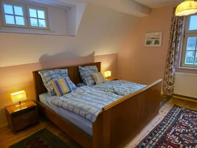 Ein Bett oder Betten in einem Zimmer der Unterkunft Gemütliche Wohnungen in Wansdorf im denkmalgeschützten Haus