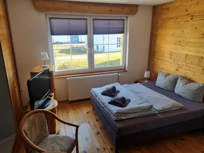 Ein Bett oder Betten in einem Zimmer der Unterkunft Hof Hegensteinbach Fürstenberg an der Havel
