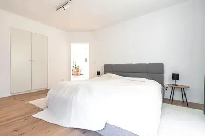 Ein Bett oder Betten in einem Zimmer der Unterkunft Modernes Waldhaus im Spreewald