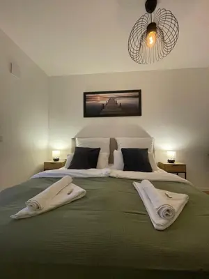 Ein Bett oder Betten in einem Zimmer der Unterkunft Großzügiges Designer Apartment