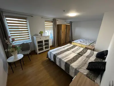 Ein Bett oder Betten in einem Zimmer der Unterkunft Ferienwohnung in Seelow nähe polnische Grenze
