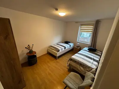Ein Bett oder Betten in einem Zimmer der Unterkunft Ferienwohnung in Seelow nähe polnische Grenze