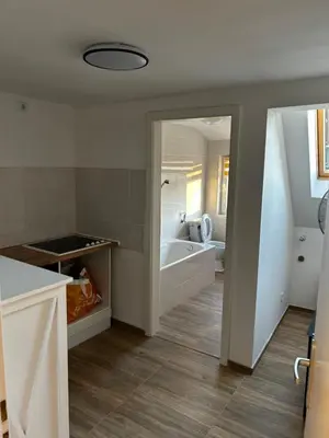 Ein Bett oder Betten in einem Zimmer der Unterkunft Ferienwohnung in Seelow nähe polnische Grenze