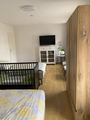Ein Bett oder Betten in einem Zimmer der Unterkunft Ferienwohnung in Seelow nähe polnische Grenze