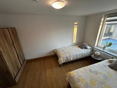 Ein Bett oder Betten in einem Zimmer der Unterkunft Kleine Ferienwohnung in Seelow