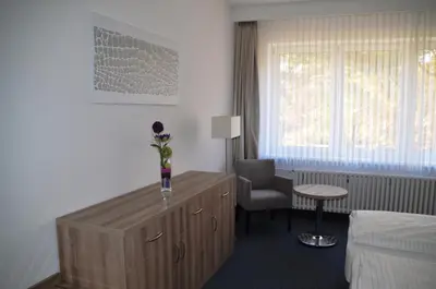 Ein Bett oder Betten in einem Zimmer der Unterkunft Gästehaus Pauline