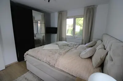 Ein Bett oder Betten in einem Zimmer der Unterkunft Haus am See