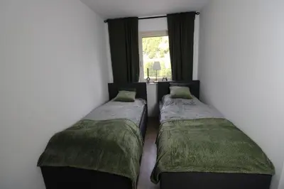 Ein Bett oder Betten in einem Zimmer der Unterkunft Haus am See