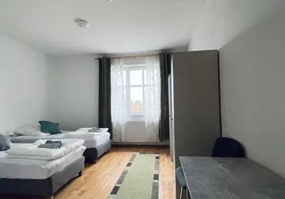 Ein Bett oder Betten in einem Zimmer der Unterkunft GPZ Monteurzimmer Unterkunft Möbliertes Zimmer Pension