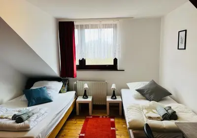 Ein Bett oder Betten in einem Zimmer der Unterkunft GPZ Monteurzimmer Unterkunft Möbliertes Zimmer Pension