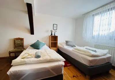Ein Bett oder Betten in einem Zimmer der Unterkunft GPZ Monteurzimmer Unterkunft Möbliertes Zimmer Pension