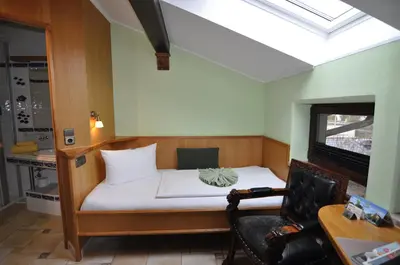 Ein Sitzbereich in der Unterkunft Hotel Blumenbach