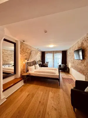 Ein Bett oder Betten in einem Zimmer der Unterkunft cinderella.kreuzberg