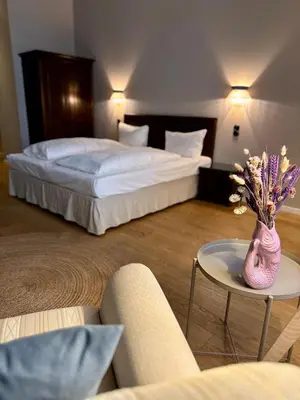 Ein Bett oder Betten in einem Zimmer der Unterkunft cinderella.kreuzberg