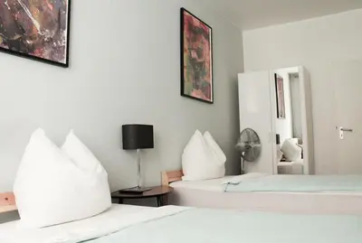 Ein Bett oder Betten in einem Zimmer der Unterkunft Krummestraße Berlin - Top Unterkunft in Charlottenburg !