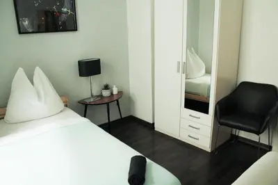 Ein Bett oder Betten in einem Zimmer der Unterkunft Krummestraße Berlin - Top Unterkunft in Charlottenburg !